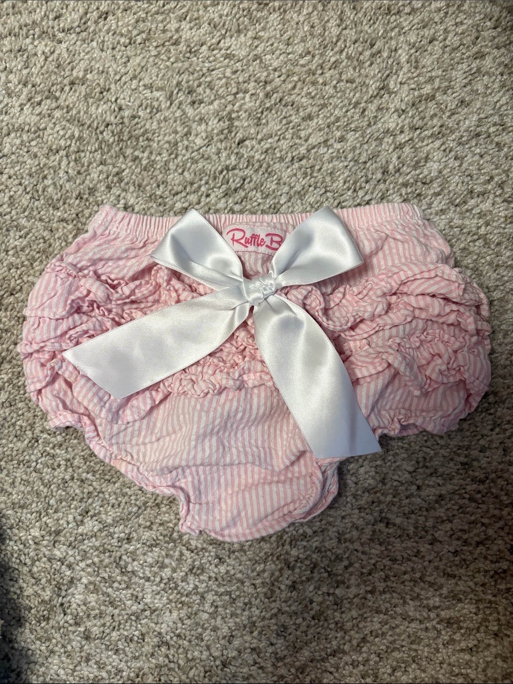 Ruffle Butts Light Pink Striped Ruffle Diaper Cover with White Satin Bow